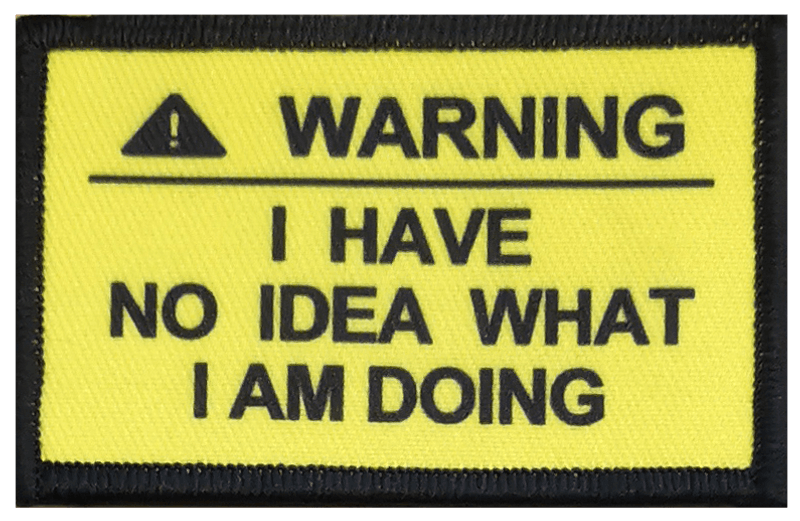 Patch: Warning I have no Idea (Borrelås-M) svart/gul jakkemerke